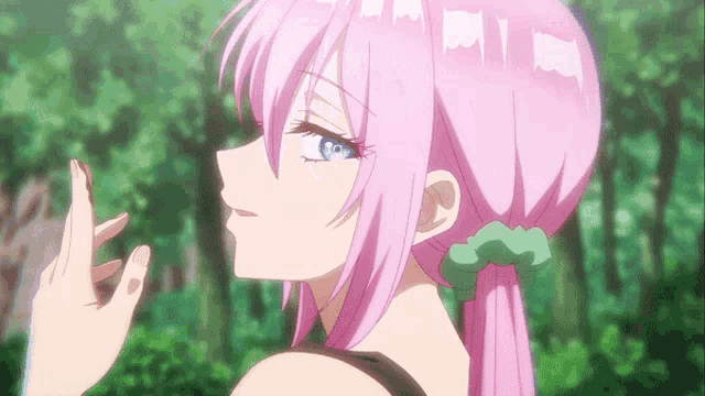 a close up of a girl with pink hair