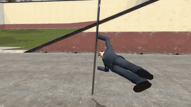 a man in a suit is hanging from a pole in a video game