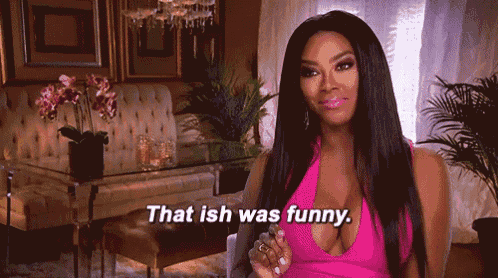 a woman in a pink dress says that ish was funny .