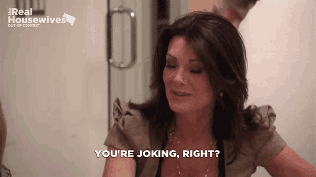 a woman says " you 're joking right " in front of a sign that says real housewives out of context