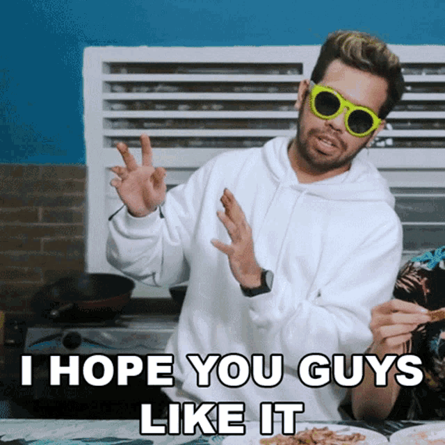 a man wearing sunglasses and a white hoodie says " i hope you guys like it "