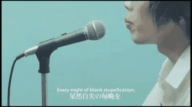 a man singing into a microphone with the words every night of blank stupefication written below him