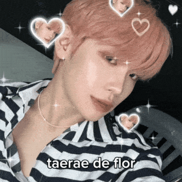 a picture of a young man with pink hair and the words taerae de flor