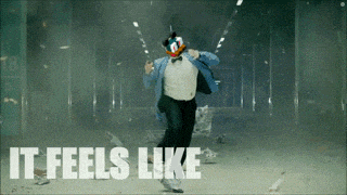 a man in a tuxedo is dancing in a tunnel with the words it feels like behind him