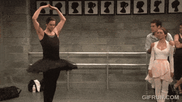 a gif from gifrun.com shows a man dressed as a ballet dancer
