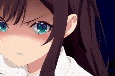 a close up of a girl 's face with a blue eye