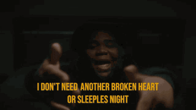 a person with their hands on their head with the words " i don t need another broken heart or sleeples night " below them
