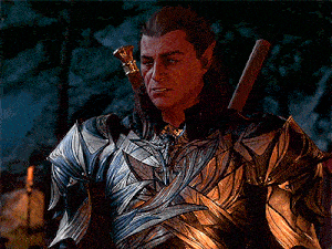 a man in armor holds a sword in his right hand