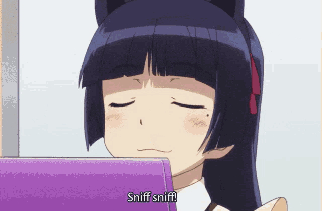 a girl with a cat ear is sniff sniffing