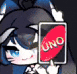 a girl is holding a card that says uno on it .