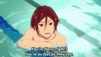 a man in a swimming pool is talking to another man .