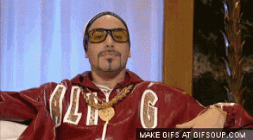 a man in a red jacket with the letter g on the front