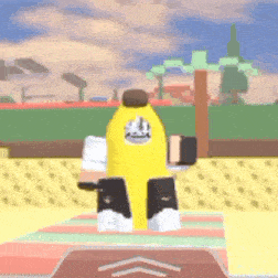 a yellow bottle with a crown on it is standing on a blanket .