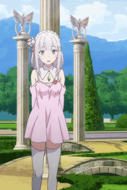 a girl in a pink dress is standing in front of pillars