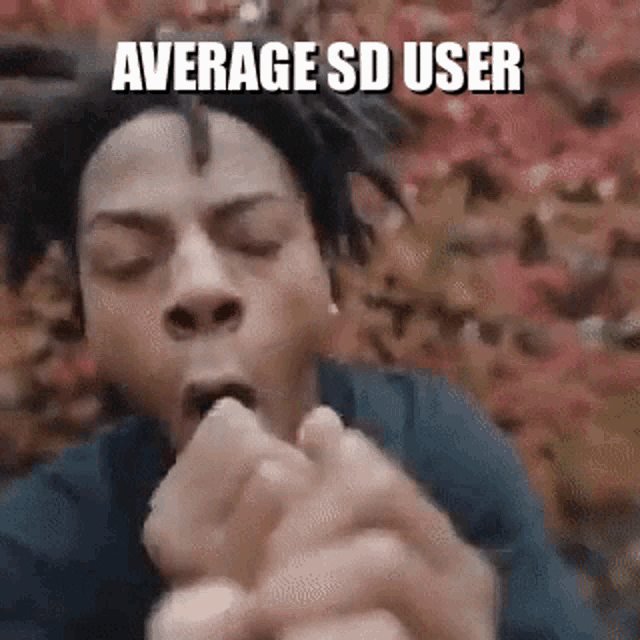 a man is eating a sandwich with the words `` average sd user '' written on the bottom .