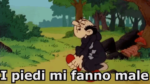 a cartoon character kneeling down with the words i piedi mi fanno male above him