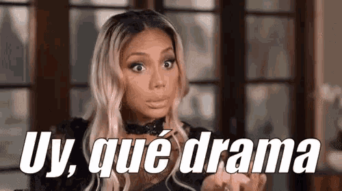 a woman is making a funny face and saying `` uy que drama '' .