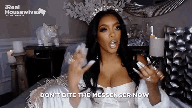 a woman in a white dress with a crown on her head says " do n't bite the messenger now "