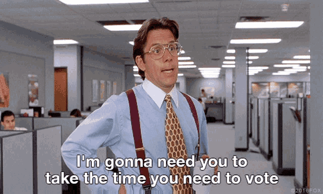 a man wearing suspenders and a tie says i 'm gonna need you to take the time you need to vote
