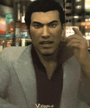 a man in a suit and a red shirt is pointing at the camera with the words viggle.ai written below him