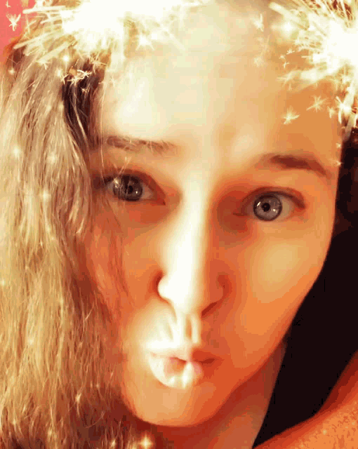 a close up of a woman making a funny face