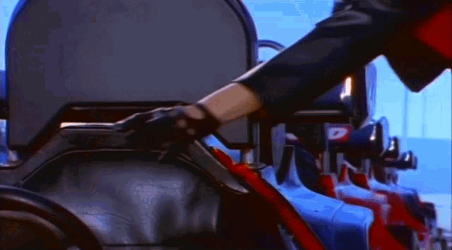 a person is riding a roller coaster with the letter d on the side