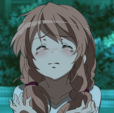 a close up of a girl 's face with tears coming out of her eyes