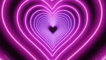 a purple heart shaped tunnel with a black heart in the center