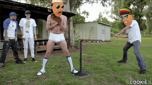 a group of men are playing a game of baseball and the word cookie is on the bottom right