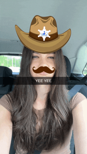 a woman wearing a cowboy hat and a fake mustache says yee yee