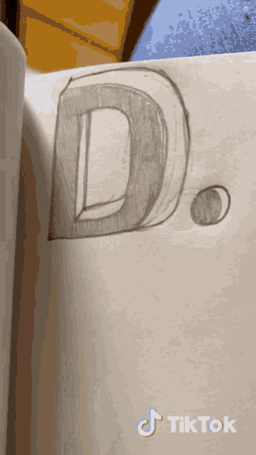 a drawing of a letter d with a tiktok watermark on the bottom right