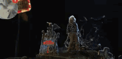 a sign that says fuse cube is next to a statue of a man