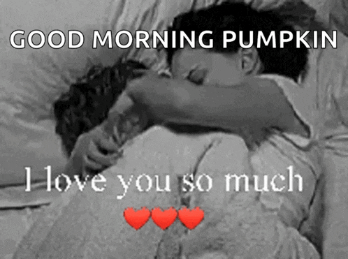a black and white photo of a couple hugging with the caption " good morning pumpkin "