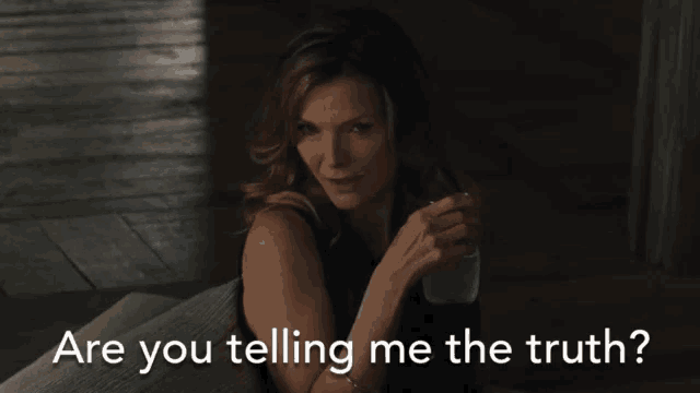 a woman holding a glass of water with the words " are you telling me the truth " below her