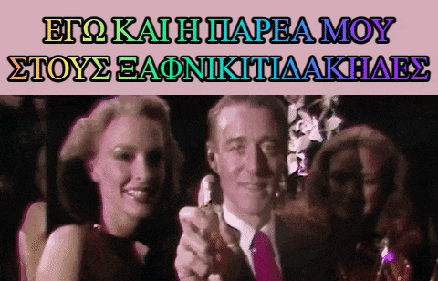 a man in a suit and tie is holding a bottle of perfume in front of a woman