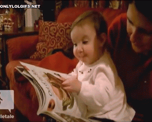 Baby Thinks She Can Eat Food From The Magazine GIF - Baby Eating Food From Magazine Magazine GIFs