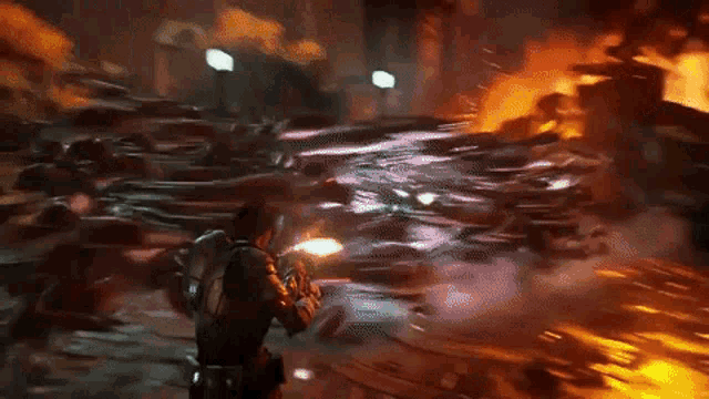 a man is holding a gun in a video game while fighting a group of monsters .