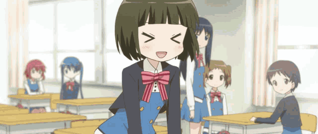 a girl in a school uniform with a pink bow stands in a classroom with other children