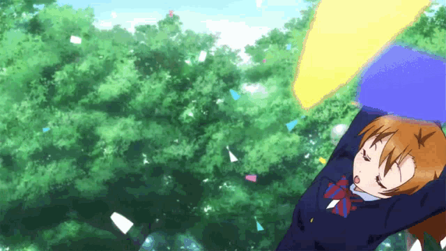 a girl in a school uniform is laying on the ground with her arms outstretched in front of trees