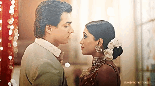 a man and a woman are looking into each other 's eyes and the word creations is on the bottom