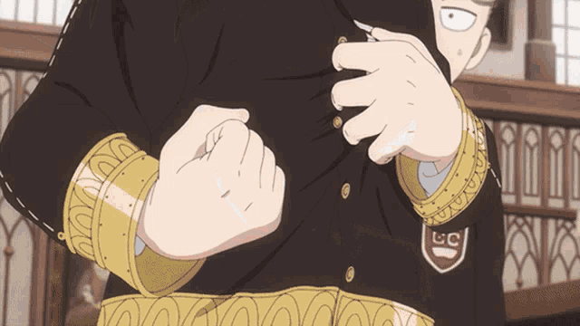 a man wearing a black jacket with gold cuffs and a lc emblem