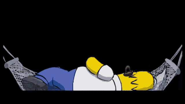 homer simpson is laying in a hammock in a dark room