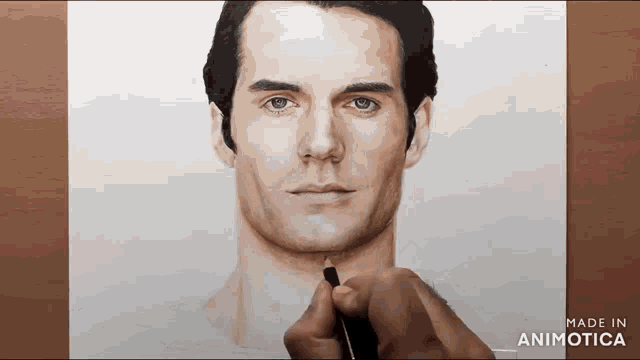 a person is drawing a man 's face with a pencil on a piece of paper made in animatica