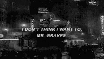 a black and white photo of a city street with a sign that says i don t think i want to