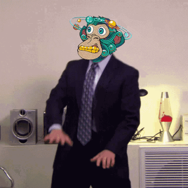 a man wearing a suit and tie has a monkey mask on his head