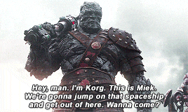 a movie scene with a monster saying hey man i 'm korg this is miek