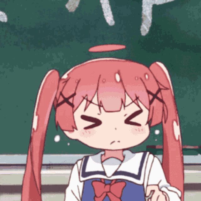 a girl with red hair and a bow on her uniform is making a face