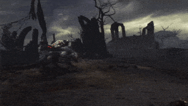 a dark landscape with a few trees and a few buildings