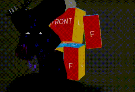 a colorful cube with the letter d on it is being thrown in the air