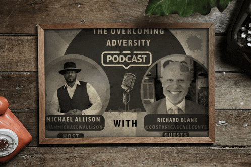 a framed poster for the overcoming adversity podcast with michael allison and richard blank